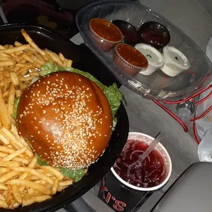 Kikis chicken sandwich with shoe string fries add pickles with kikis sauce
