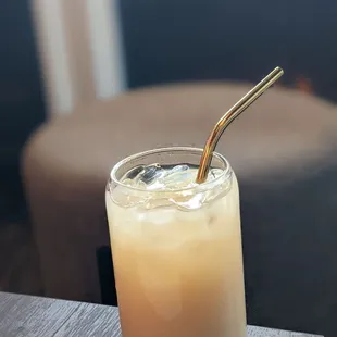 a drink in a glass with a straw