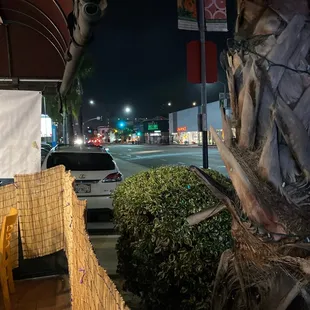 a view of a street at night