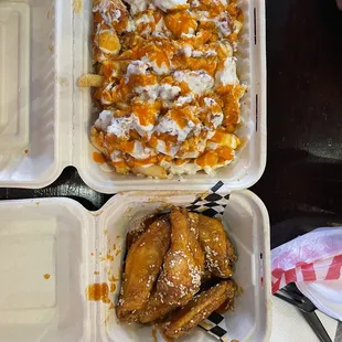 Kikis Fries (with Chicken) and Kiki&apos;s flavored Wings
