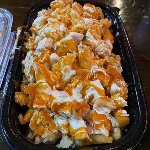Kikis Fries (with Chicken) ~ $9.99 (medium)