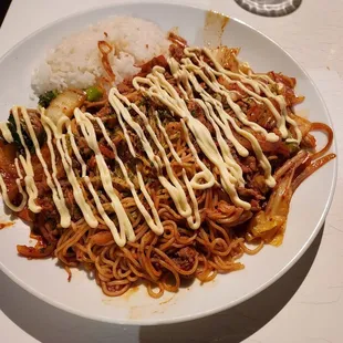 a plate of noodles and sauce