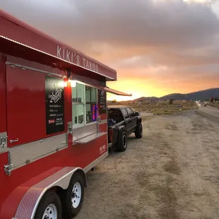 a truck parked in front of a food truck
