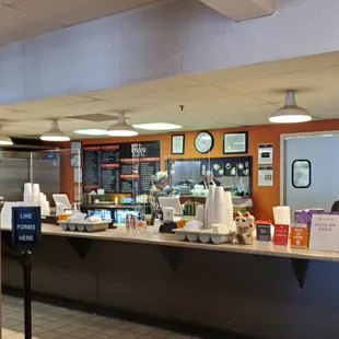 Walk-up to order menu/cashier area.