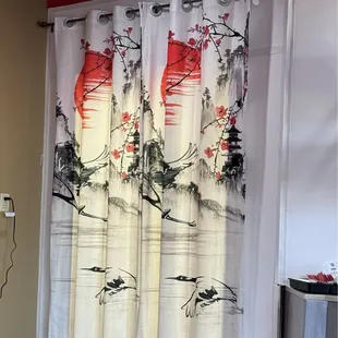 Beautiful curtains in front of kitchen. So reminiscent of my years in Japan.