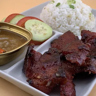 Pork Tocino. Sweet-salty marinated pork, slow cooked and fried to perfection. Served with garlic fried rice.