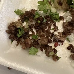 Burned tiny pieces of meat