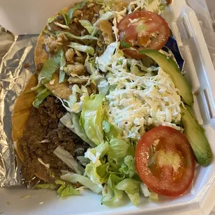 a close up of a taco in a styrofoam container