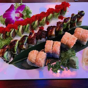 a platter of sushi and rolls