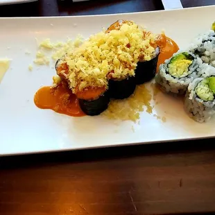 Salmon crunchy roll &amp; avocado/ cucumber roll.