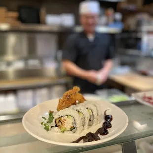 a sushi roll on a plate