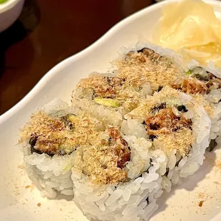 a plate of sushi on a table