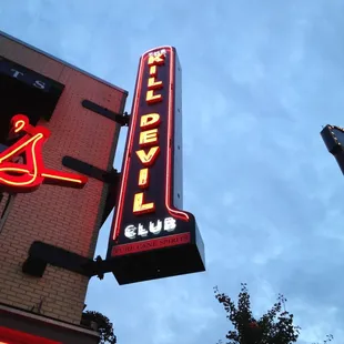 a neon sign on a building