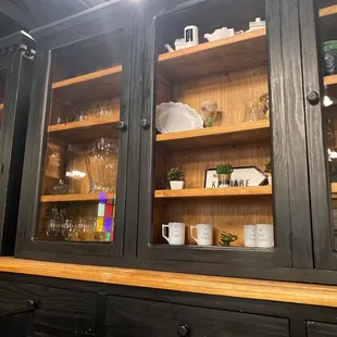 a collection of dishes and cups
