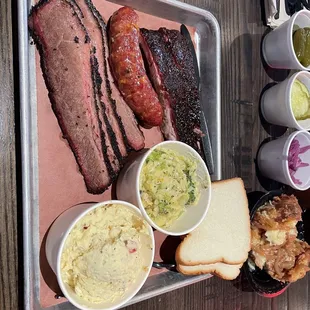 Brisket, jalapeño sausage, pork ribs, broccoli cheese casserole, potato salad, bread pudding