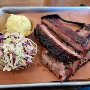 Two Meat plate with brisket and ribs and two sides: potato salad and cole slaw.