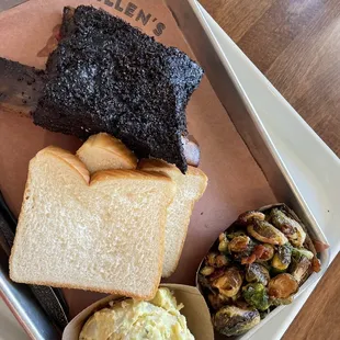 Beef rib plate with Brussel sprouts and potato salad for sides