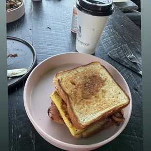 &quot;The handheld&quot; breakfast sandwich - Texas toast, bacon, &amp; egg. Gingerbread latte.