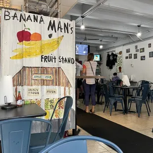a banana man&apos;s fruit stand