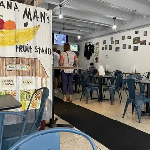 the interior of a banana man&apos;s fruit stand