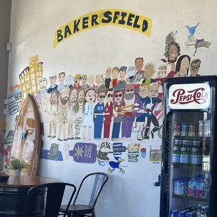 a wall with a variety of stickers on it