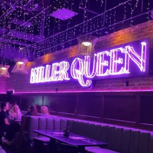 The Neon Sign on the Front Wall