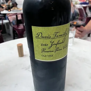 a bottle of wine on a table