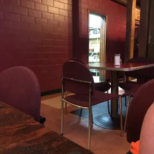 Looking towards hallway leading to bathrooms and back of kitchen