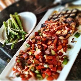 Maple-glazed pork chops, sweet potato corn hash (paleo peeps can get it minus  corn) &amp; asparagus. Look at that portion...delish!