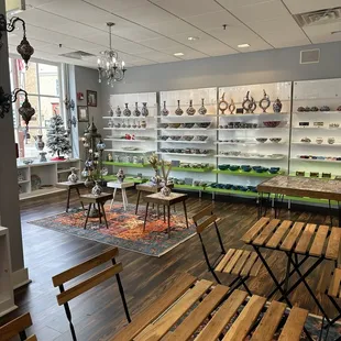 rows of wooden benches in a store