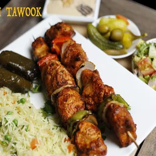 a plate of food and a salad