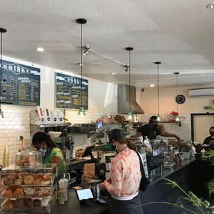 a woman standing at the counter