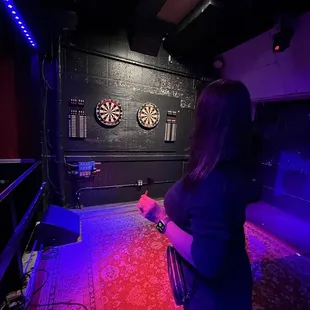Darts in the back