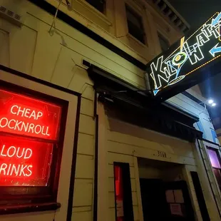a neon sign for a liquor bar