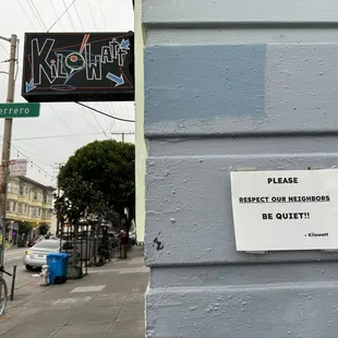 a sign on the side of a building