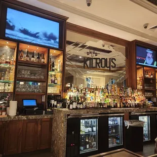 a woman sitting at the bar