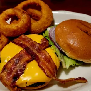 Bacon cheeseburger with no tomato and onion rings.