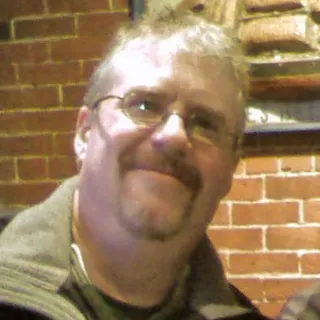 Mark E.
