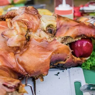 a large piece of meat on a cutting board