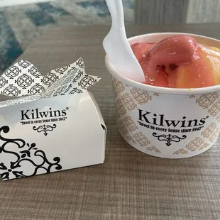 1:2 scoop of raspberry and 1/2 scoop of lemon sorbet. The box holds secret chocolate selections