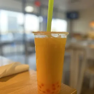 Mango boba with strawberry popping bubbles