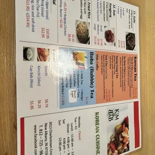 a menu on a wooden table