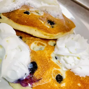 Blueberry pancakes with whip cream
