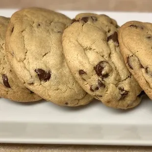a plate of chocolate chip cookies