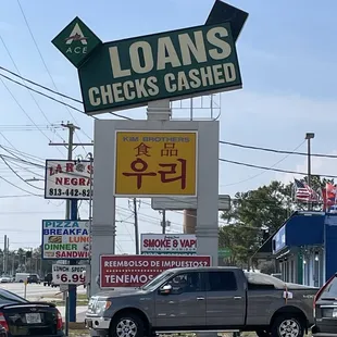 a car parked in front of the sign