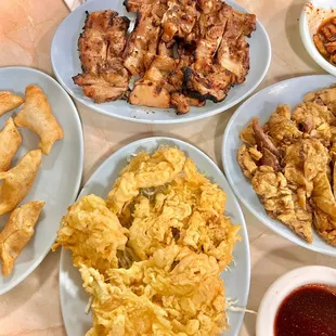 Clockwise: mandoo, bbq chicken, meat jun, shrimp tempura