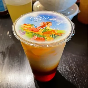 a plastic cup with a drink in it