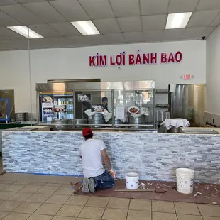 a man working on the counter
