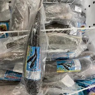 a variety of fish wrapped in plastic