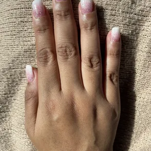 Ombré fill (it has glitter) pink to white tips.